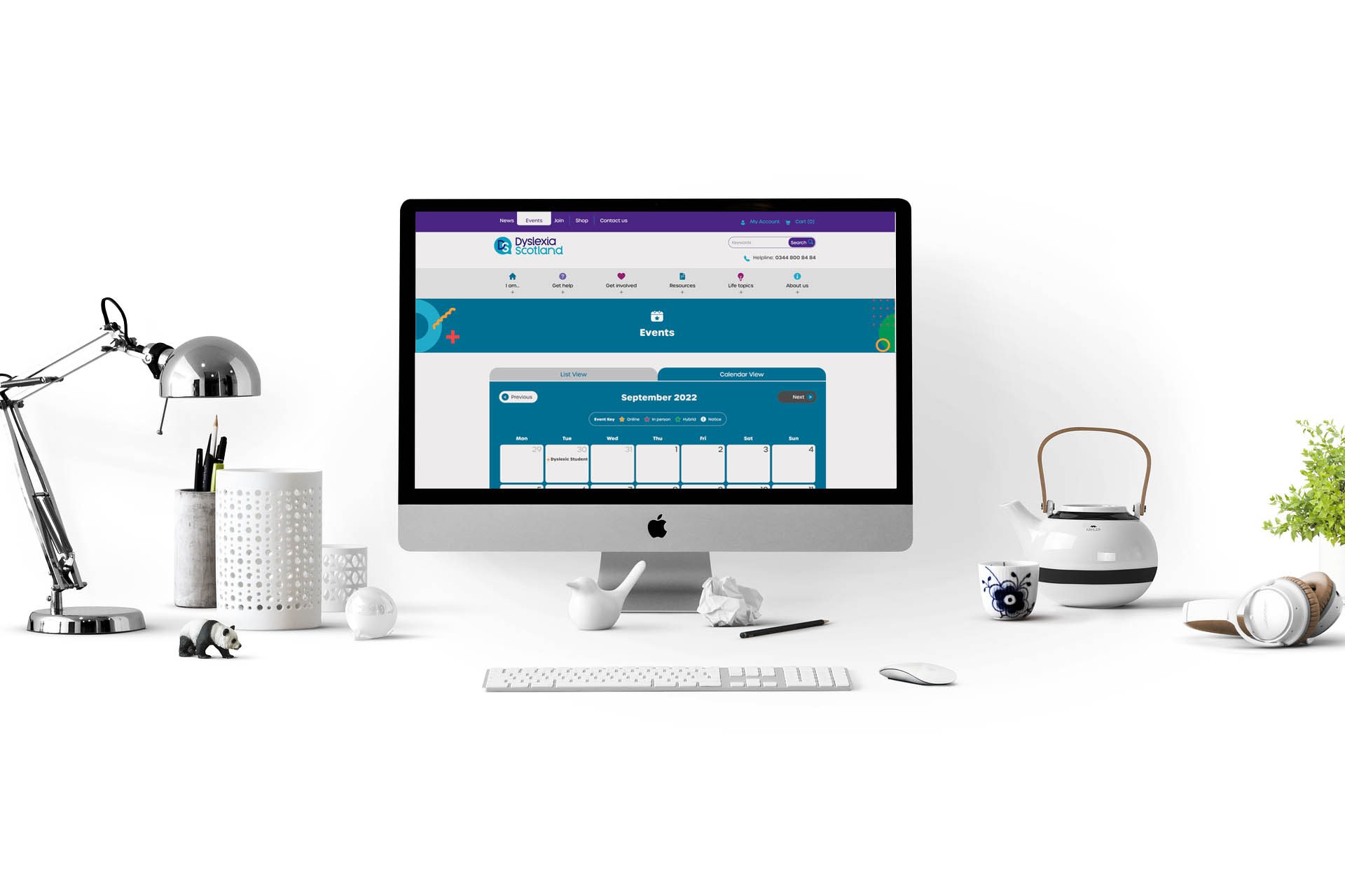 A Mac computer showing the Dyslexia Scotland website onscreen