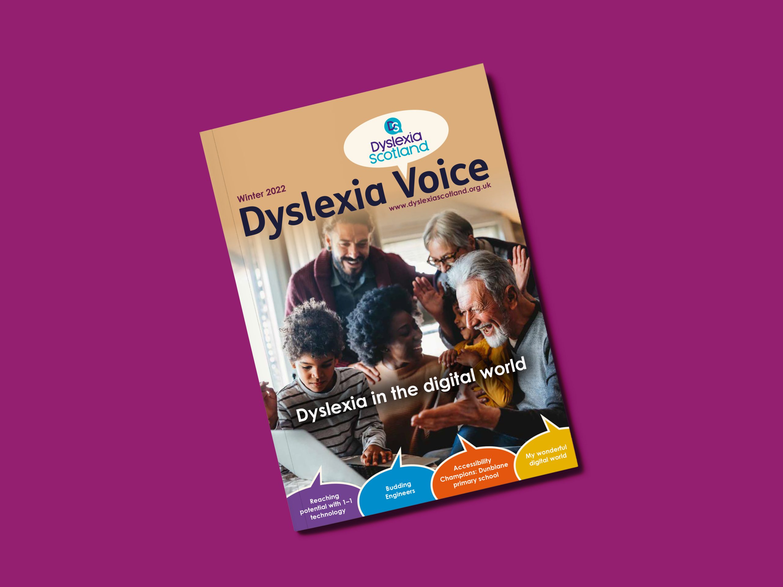 Dyslexia Voice magazine against a berry-coloured background.