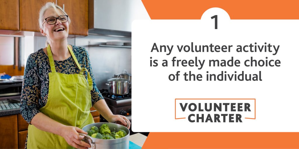 Woman wearing an apron in a kitchen. Text reads: Any volunteer activity is a freely made choice of the individual.