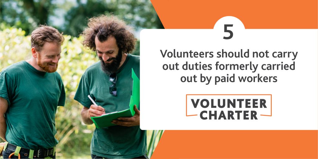 2 men in green tshirts in outdoor setting. Text reads: Volunteers should not carry out duties formerly carried out by paid workers.