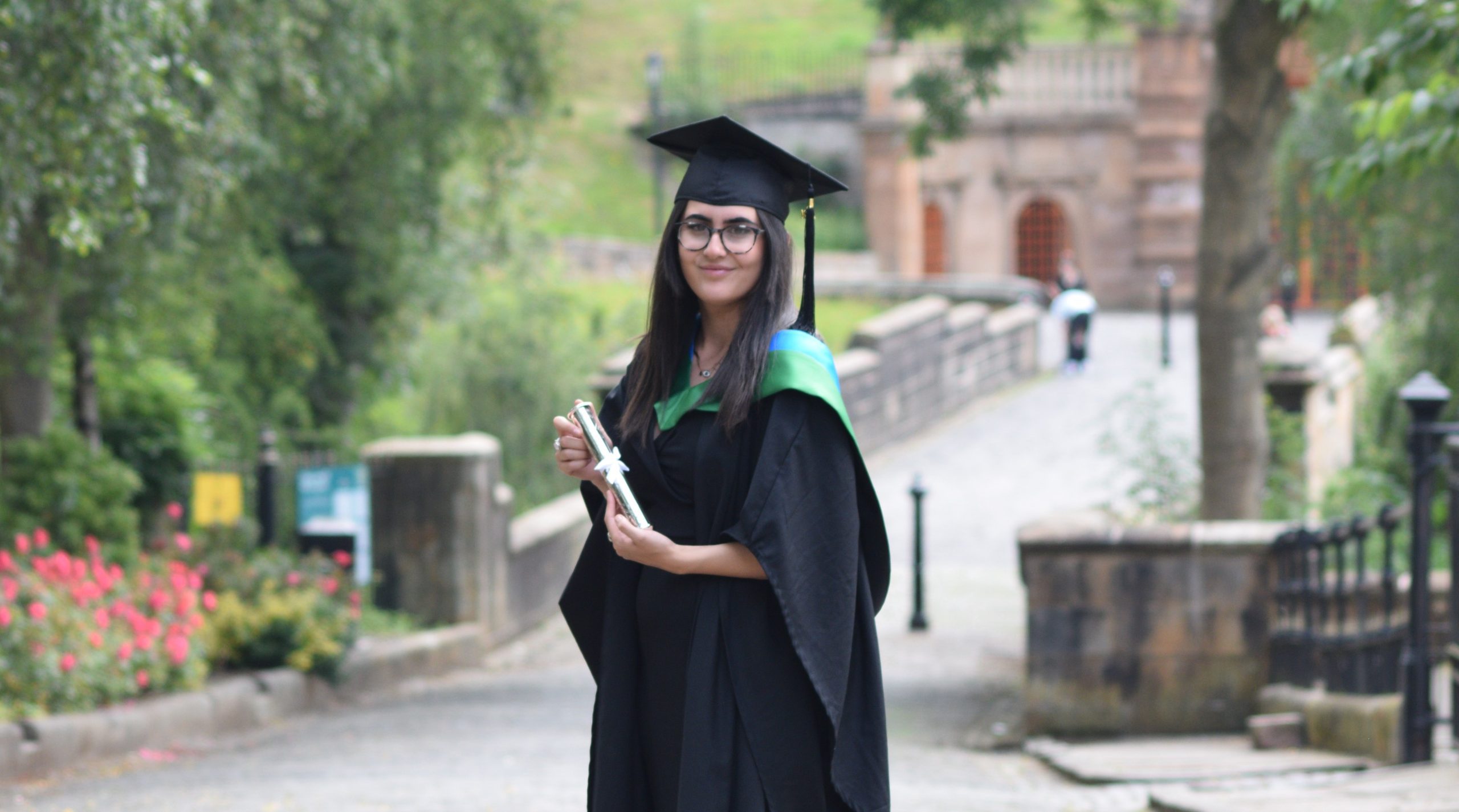 Katy in graduation robes.