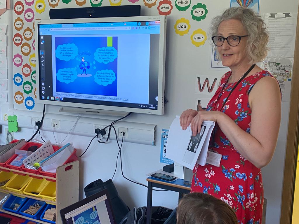 Teacher in a primary clasroom setting