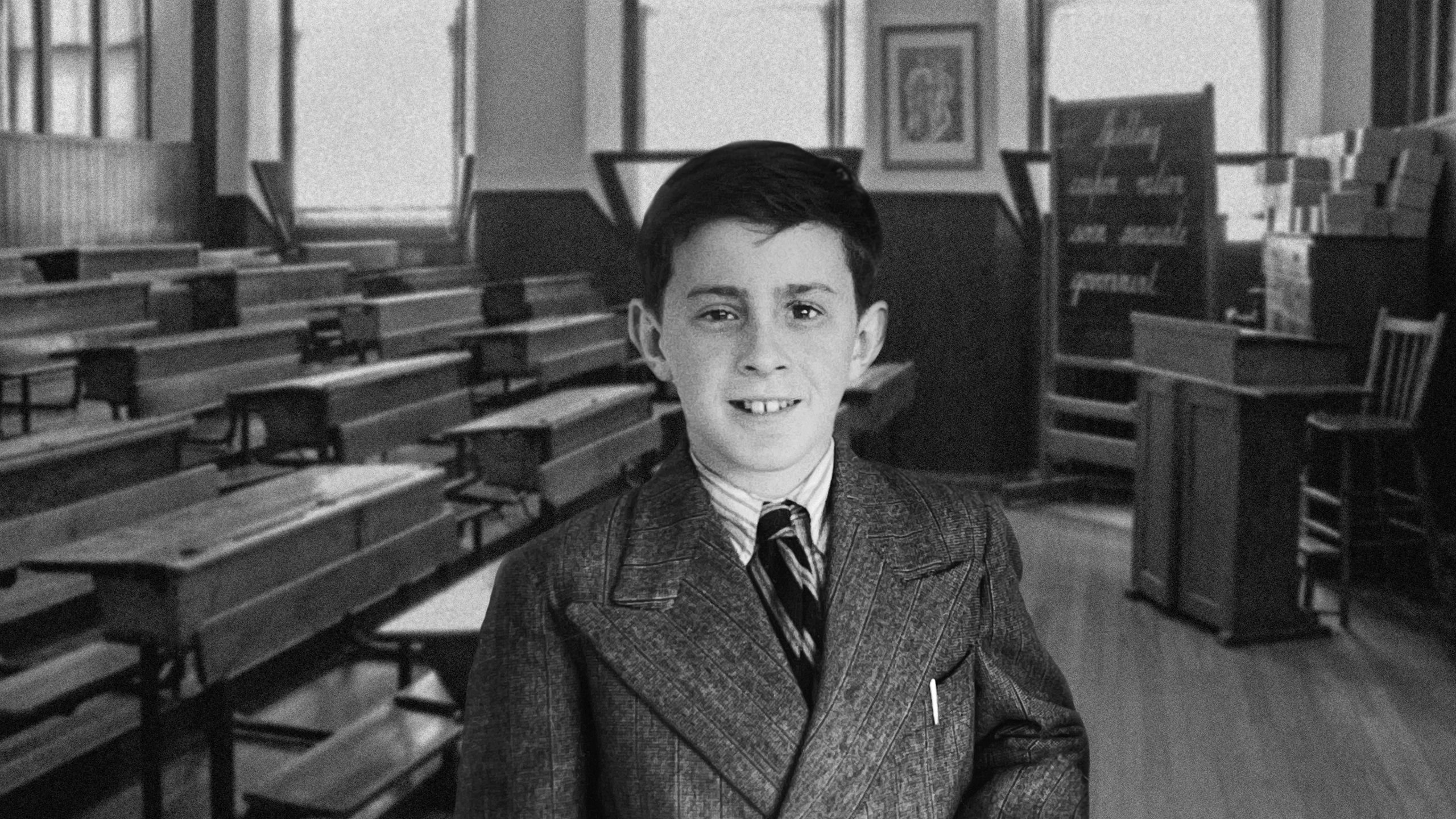 Sir Jackie Stewart as a child in school