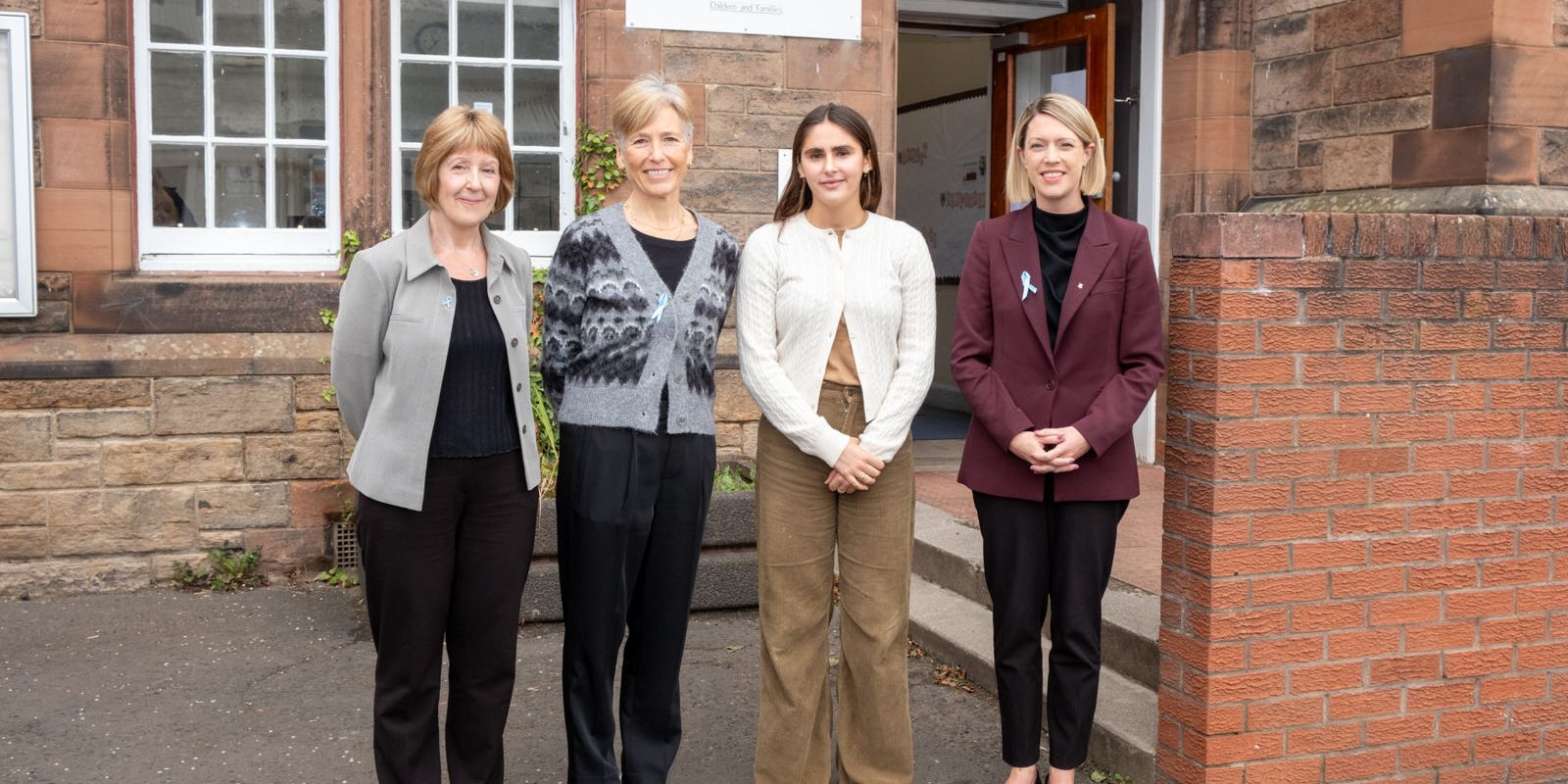 The Cabinet Secretary, CEO of Dyslexia Scotland, a representative of the Sean Connery Foundation and a Rosewood primary staff member stand in fron of the school.