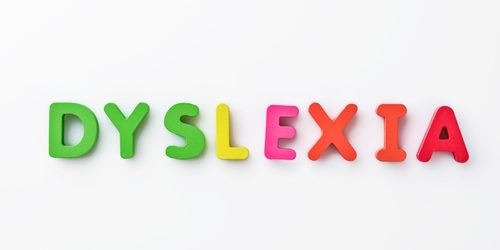 The word dyslexia in colourful letters