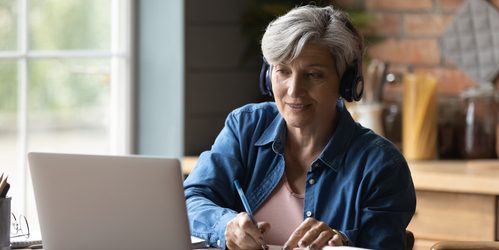 Adult learner using a computer
