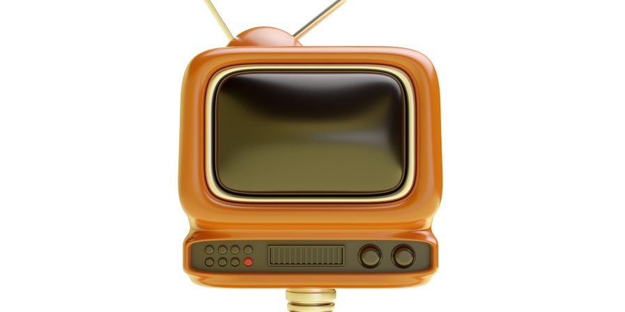 An orange robot with an old TV for a head