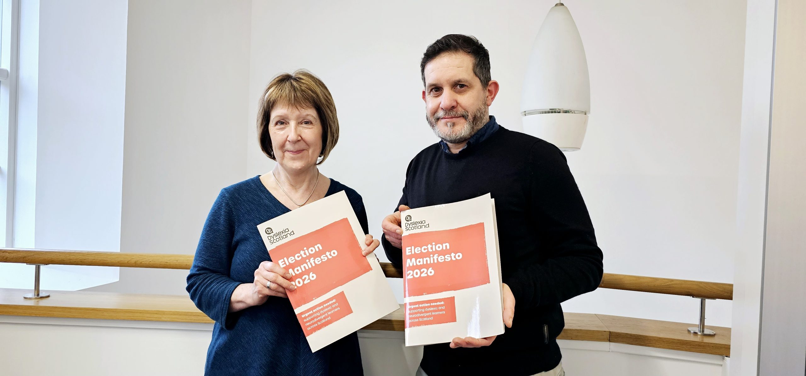 Dyslexia Scotland representatives with copies of their Manifesto