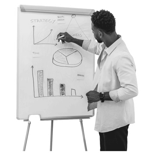 A man draws diagrams on a flip chart